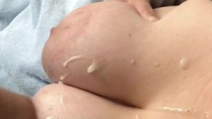 Cumshot on big tits milf