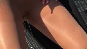 Pissing in nylons in front of the supermarket