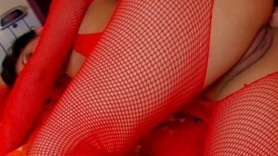 Brunette in red fishnet body takes anal and cum on face