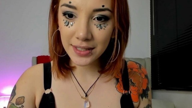 Redhead otaku with tattooed body and big tits knows how to suck